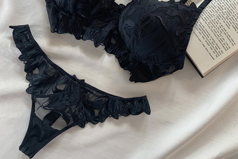 A black floral lace mastectomy bra and a black floral lace thong