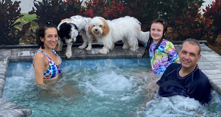 Abby and family in hot tub
