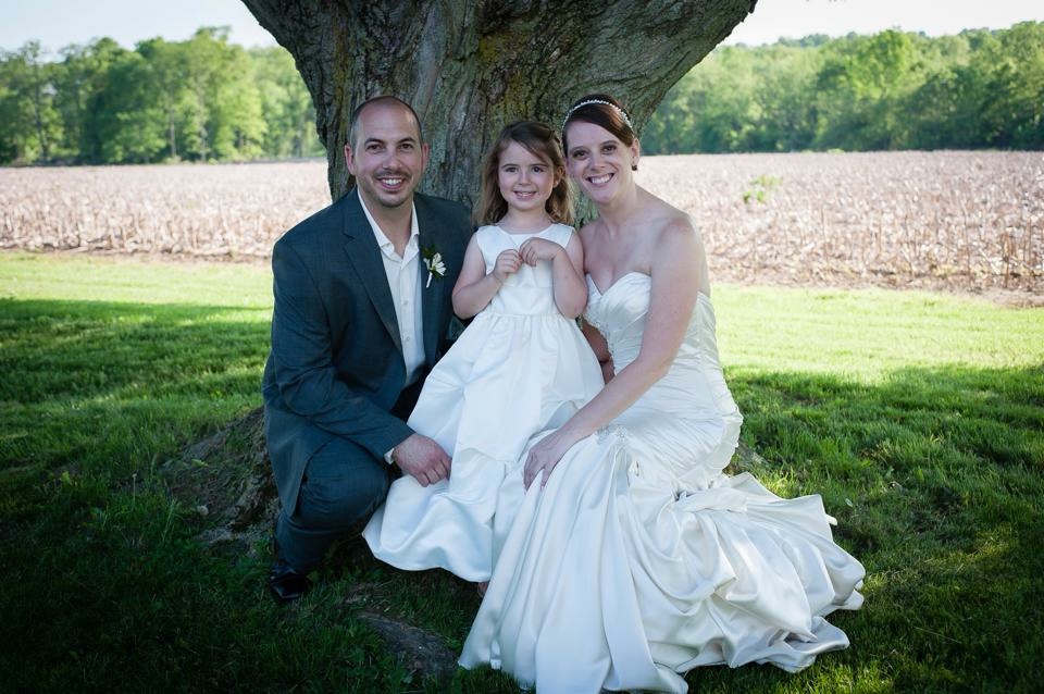 Jocelyn Mader with her husband and daughter on her wedding day, before she was diagnosed with breast cancer