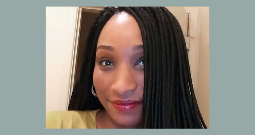 Closeup of Kiana with dreadlocks.