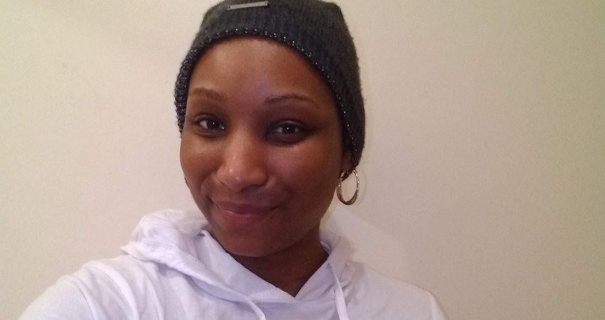 Kiana selfie wearing knit cap.